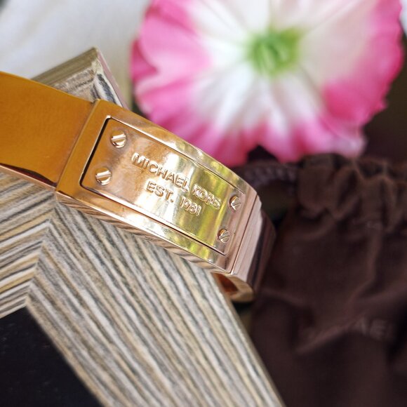 Michael Kors Jewelry - MK rose gold hinged bracelet